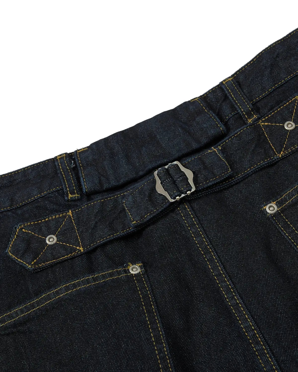 INFLATION Cinch Back Buttons Up Cargo Jorts, denim shorts with adjustable waist, button details, and rolled cuffs on a model.