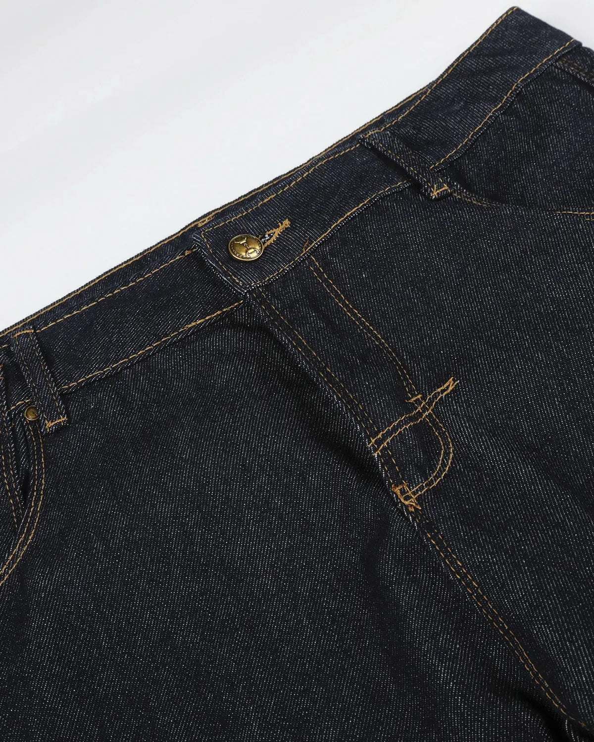 Raw Wash Barrel Jeans with Cinch Back by INFLATION featuring a relaxed fit and distinctive cinch waist detail.