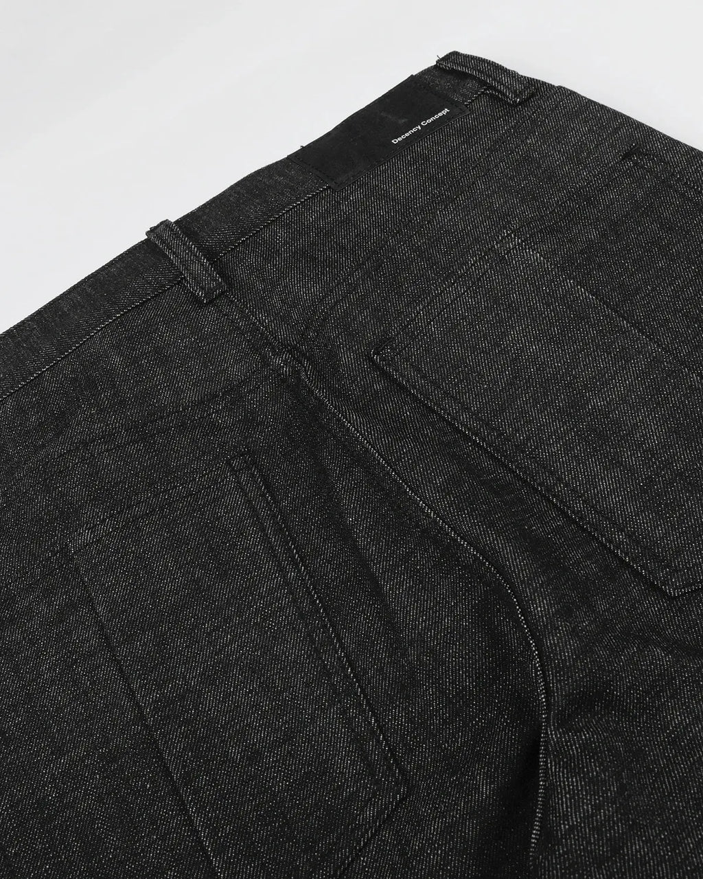 Baggy raw jeans with button details from Inflation Streetwear, featuring a deconstructed design and casual streetwear style.