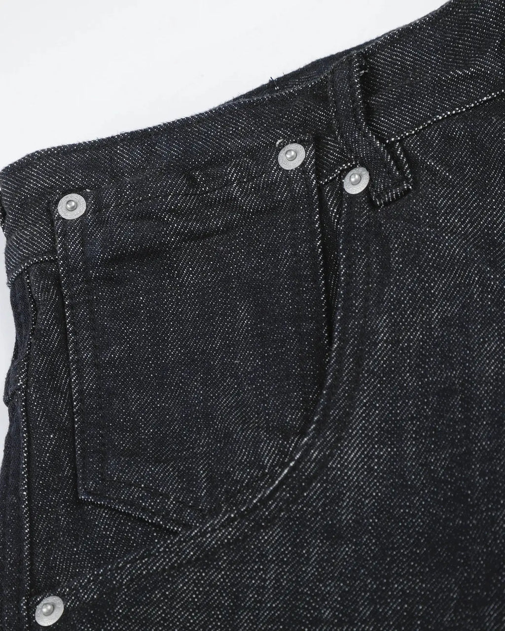 Cinch back raw baggy jeans by INFLATION Streetwear, featuring loose fit and distressed denim, displayed on a neutral background.
