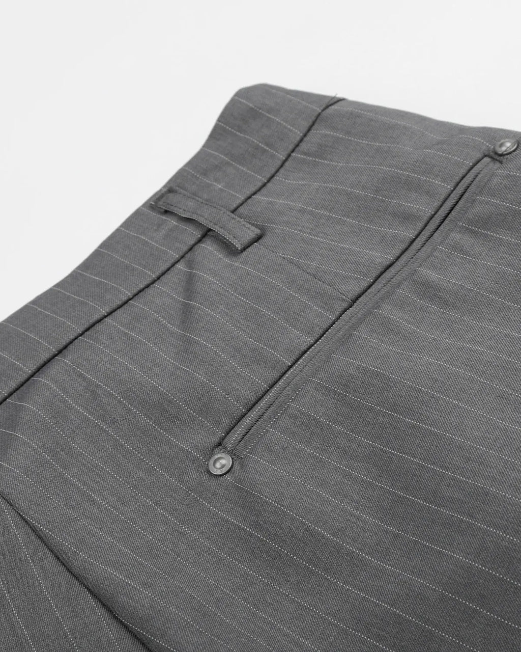 Inflation Streetwear pinstripe pleated shorts with ring detail, tailored design, and stylish fit, perfect for modern street fashion.