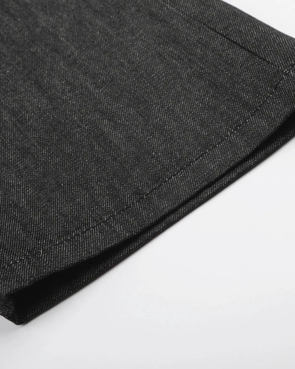 Inflation Button Detail Raw Baggy Jeans with large buttons and distressed denim, relaxed fit streetwear style.