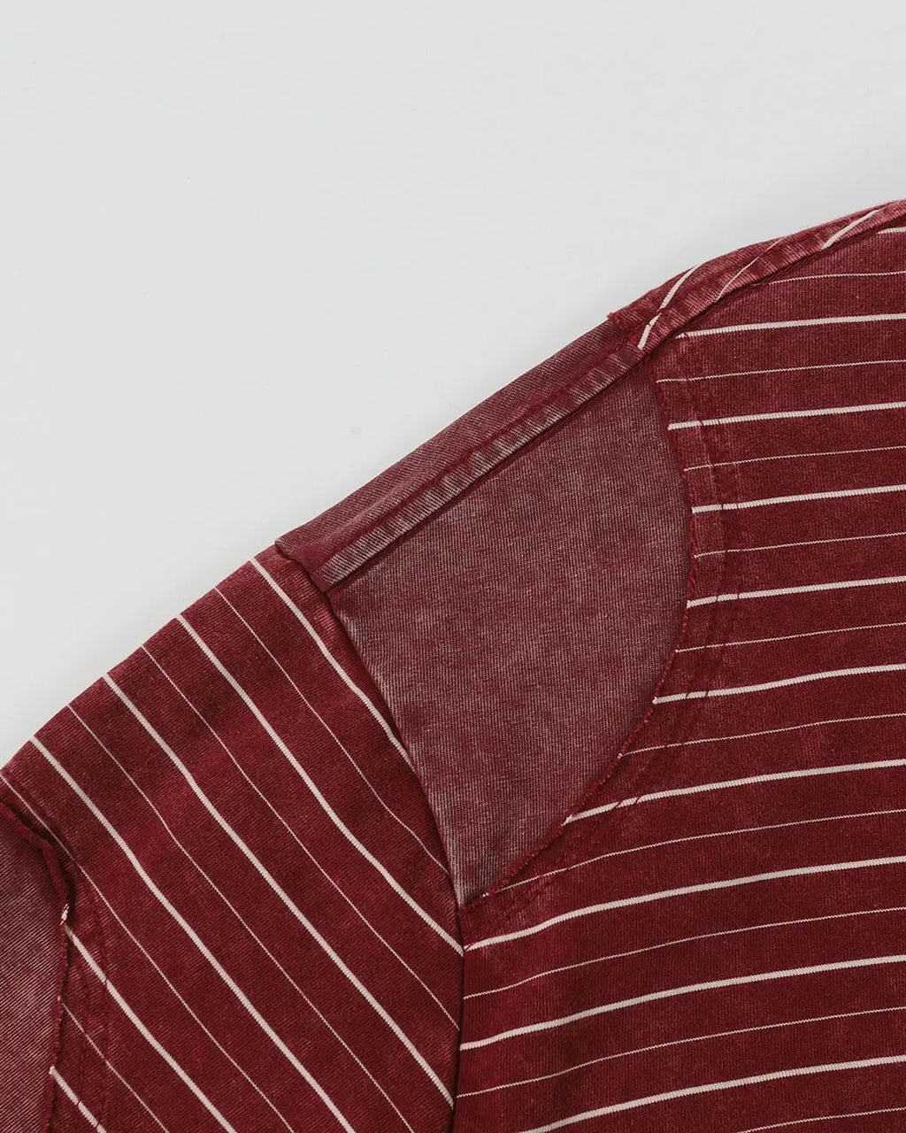Striped patchwork washed t-shirt by INFLATION Streetwear featuring colorful, casual design with mixed fabric patterns and a relaxed fit.