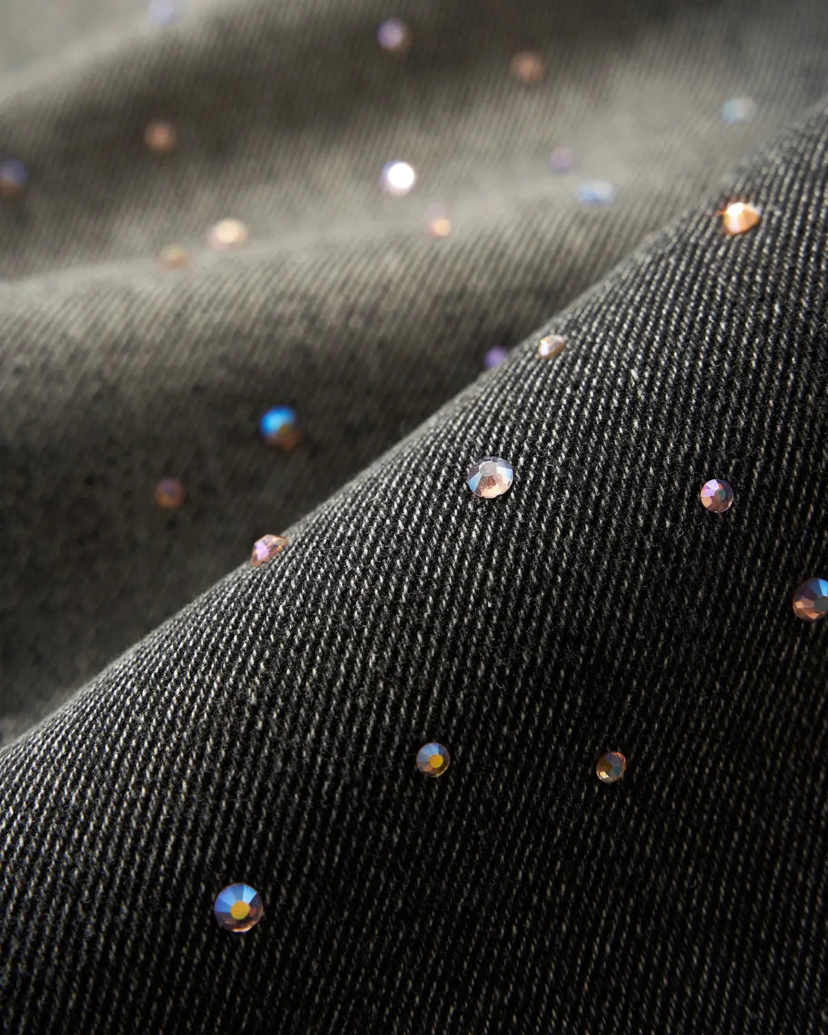 Colorful rhinestone wash baggy jeans by Flation featuring vibrant rhinestone embellishments and a relaxed streetwear fit.