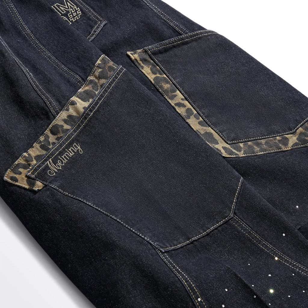 Leopard patch rhinestone barrel jeans by INFLATION featuring bold leopard print and rhinestone accents, streetwear style.