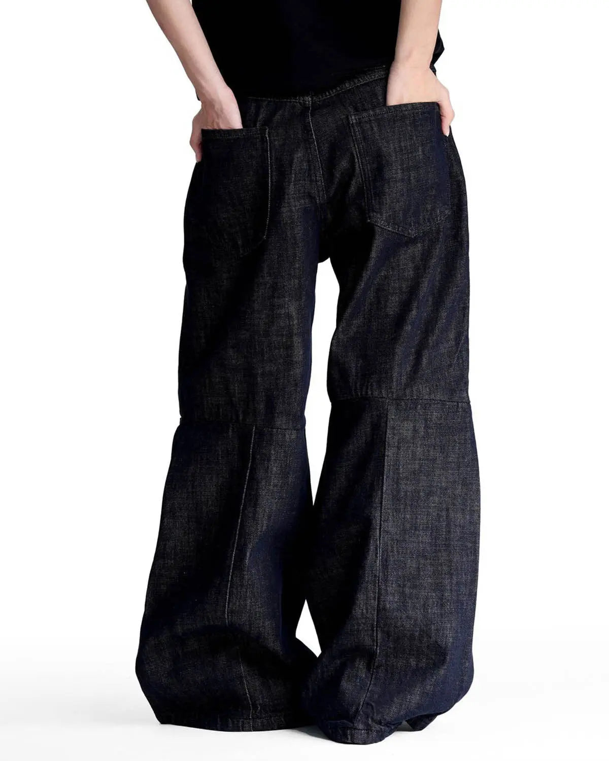 Inflation Streetwear Cinch Back Raw Baggy Jeans with adjustable waistband and distressed denim, relaxed fit and raw hem details.