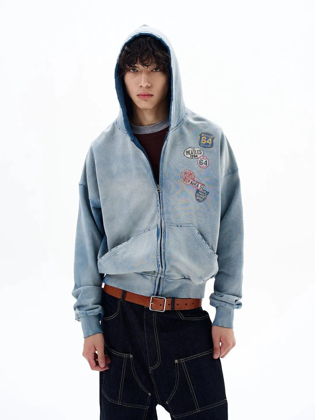 Blue distressed acid wash zip-up hoodie by INFLATION Streetwear, showcasing a casual fit with a drawstring hood and front zipper detailing.
