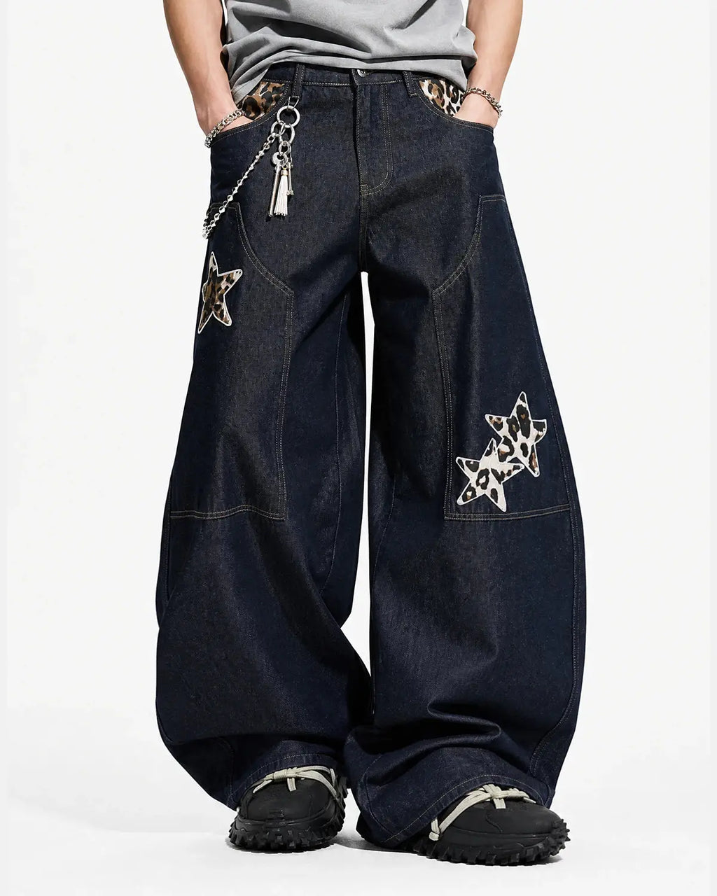 Inflation Streetwear leopard star patch barrel jeans showing distressed denim with leopard and star patches on the legs.