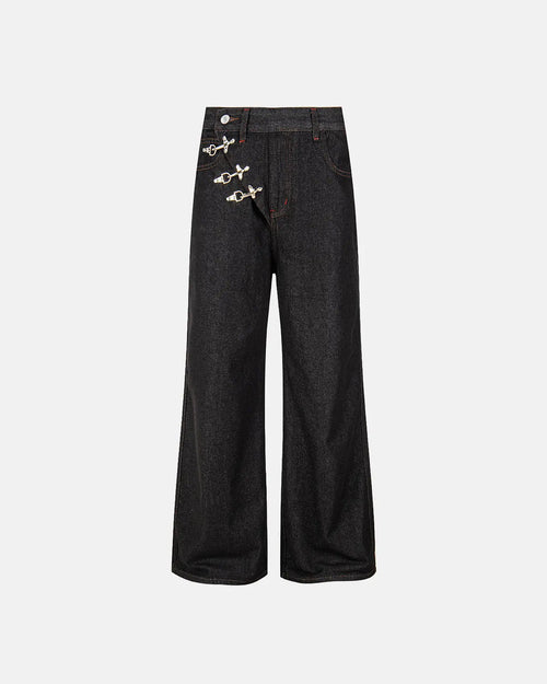 Asymmetric buckle raw baggy jeans by INFLATION featuring loose fit, distressed details, and unique front buckle design.