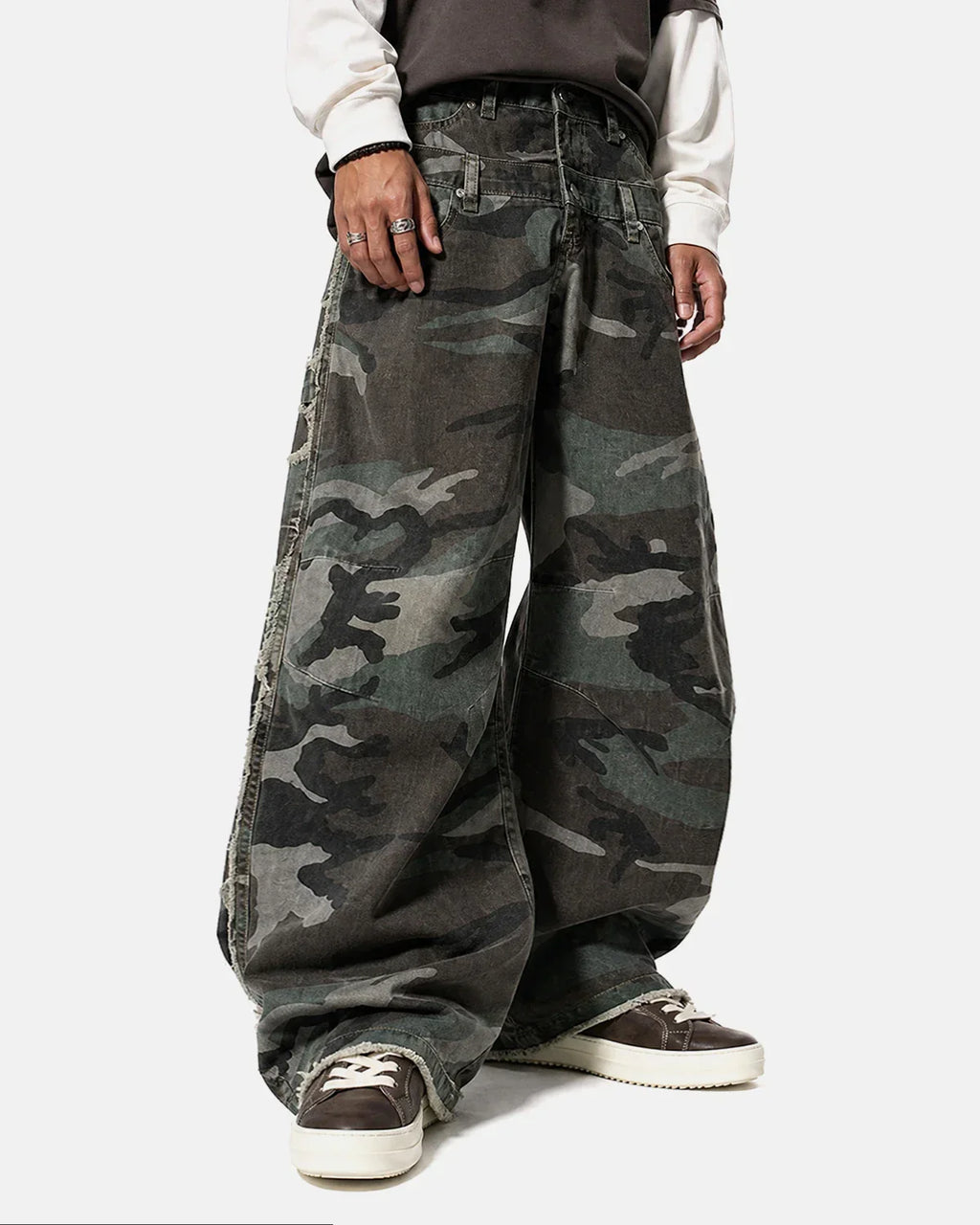 Inflation Streetwear double waist camo cargo pants with multiple pockets and adjustable straps, featuring a military-inspired camouflage pattern.