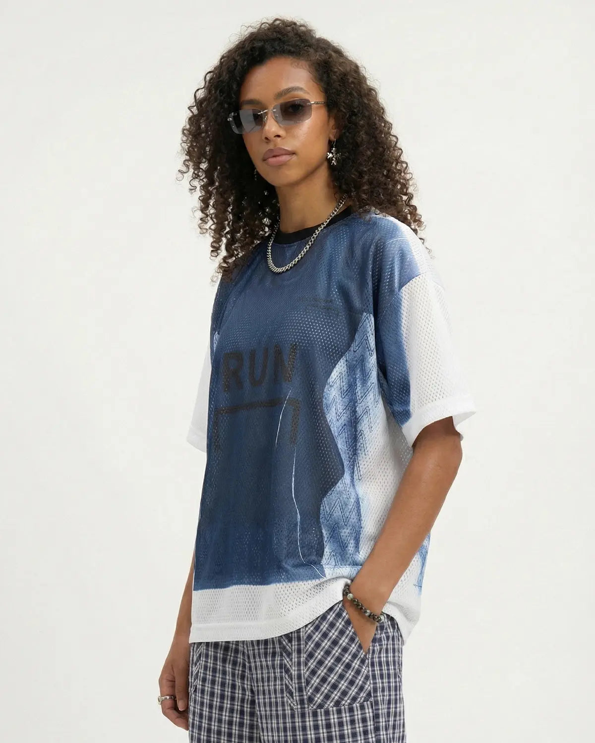 Digital printing mesh jersey T-shirt by INFLATION featuring breathable mesh fabric and bold streetwear design.