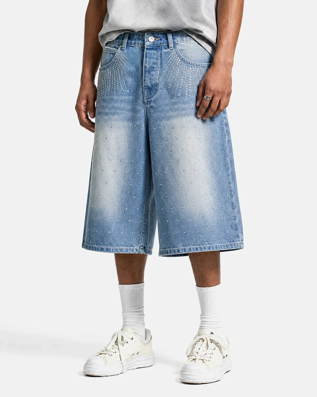 Blue rhinestone baggy jeans shorts by Flation, featuring distressed denim and loose fit, styled with visible rhinestone details.