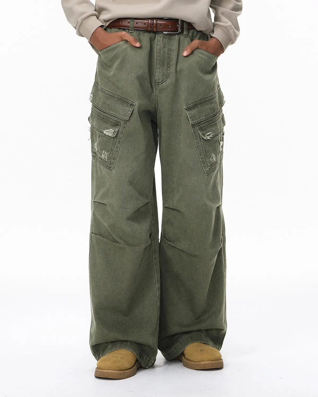 Inflation streetwear garment wash ripped cargo pants with distressed details and multiple pockets, casual urban style.