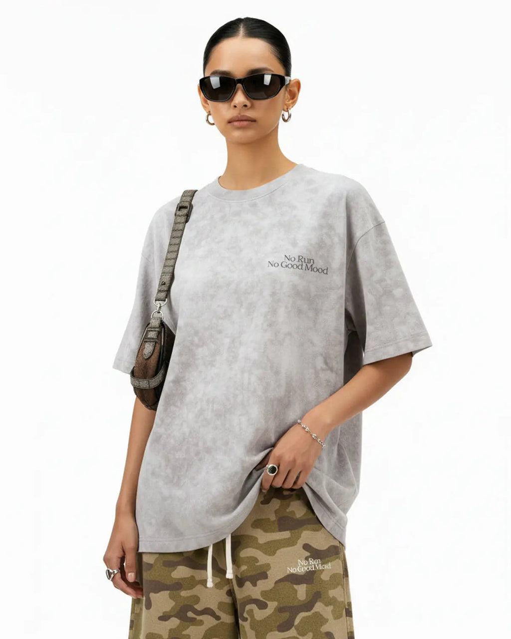 Distressed tie-dye reflective print T-shirt by INFLATION, streetwear style with bold, colorful design and reflective accents.