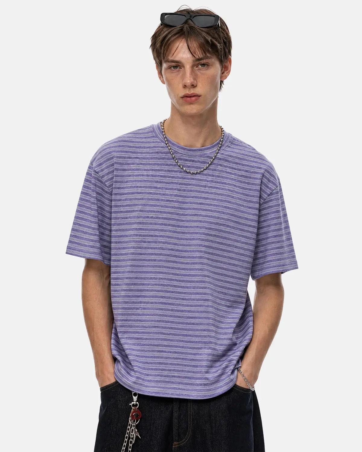 Retro striped boxy T-shirt by INFLATION, featuring bold colorful stripes and a relaxed fit, designed for streetwear style.