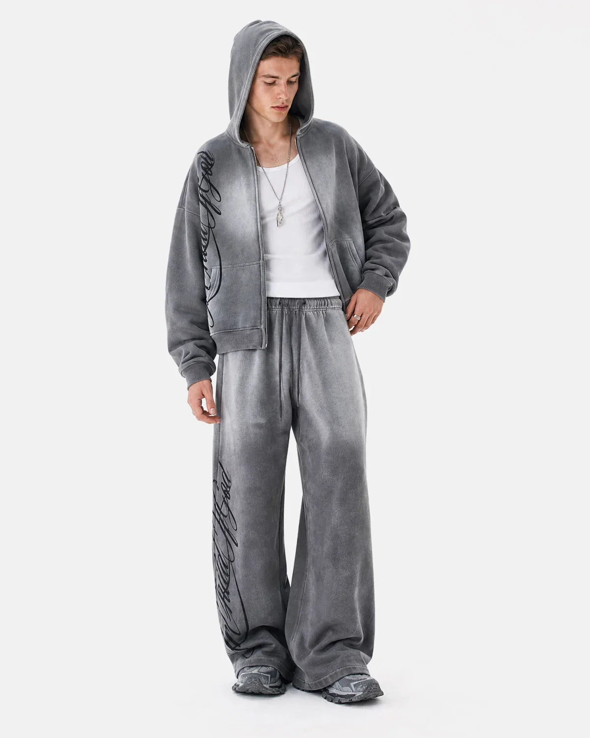 Acid washed beige sweatpants by INFLATION Streetwear, casual fit with distressed, vintage-inspired fabric and elastic waistband.