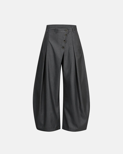 Asymmetric pleated barrel-leg suit pants by Flation Streetwear, featuring a modern tailored fit and stylish design.