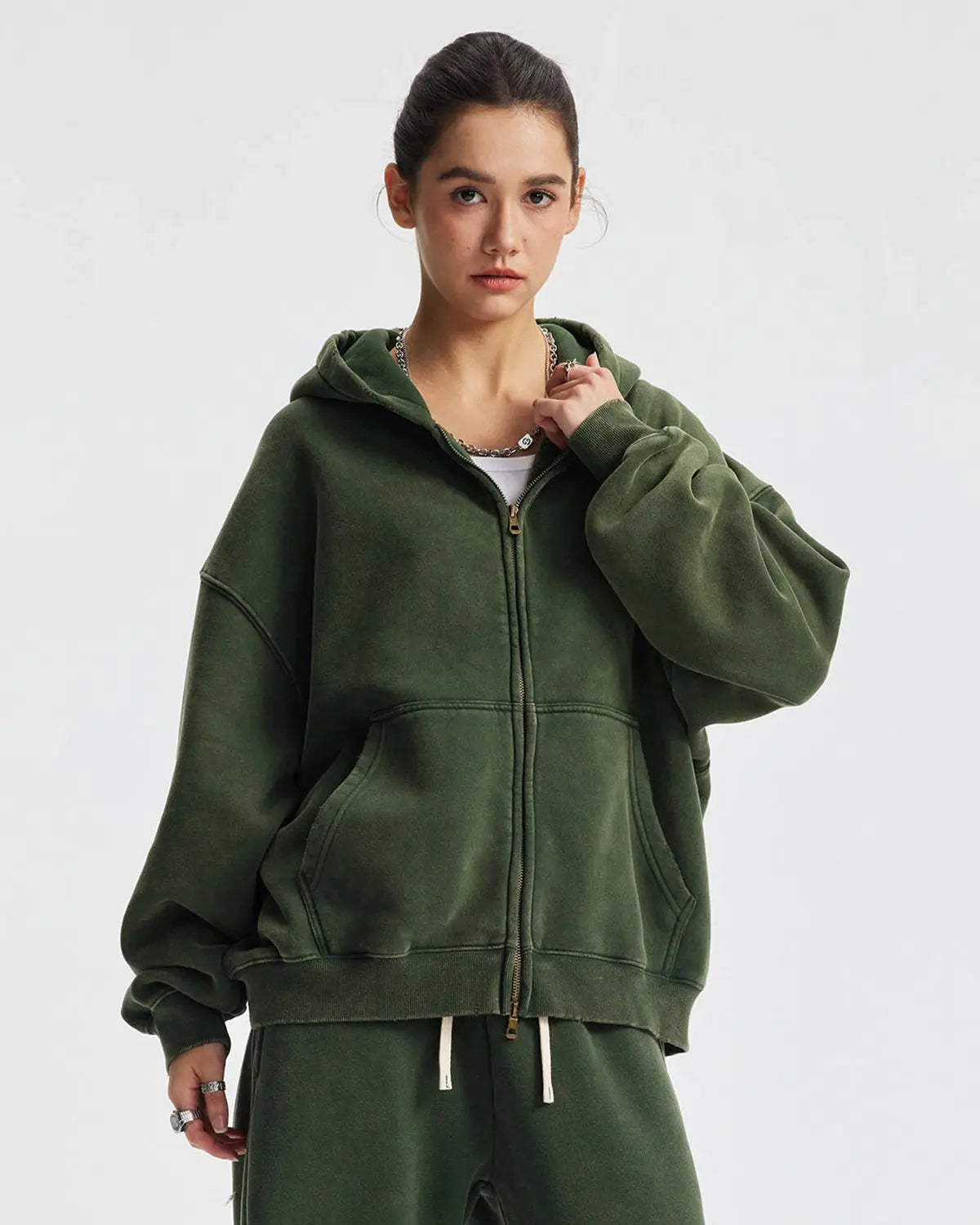 Boxy fit acid washed fleece zip-up hoodie from Flation Streetwear, showing a relaxed fit with a front zipper and washed fabric texture.
