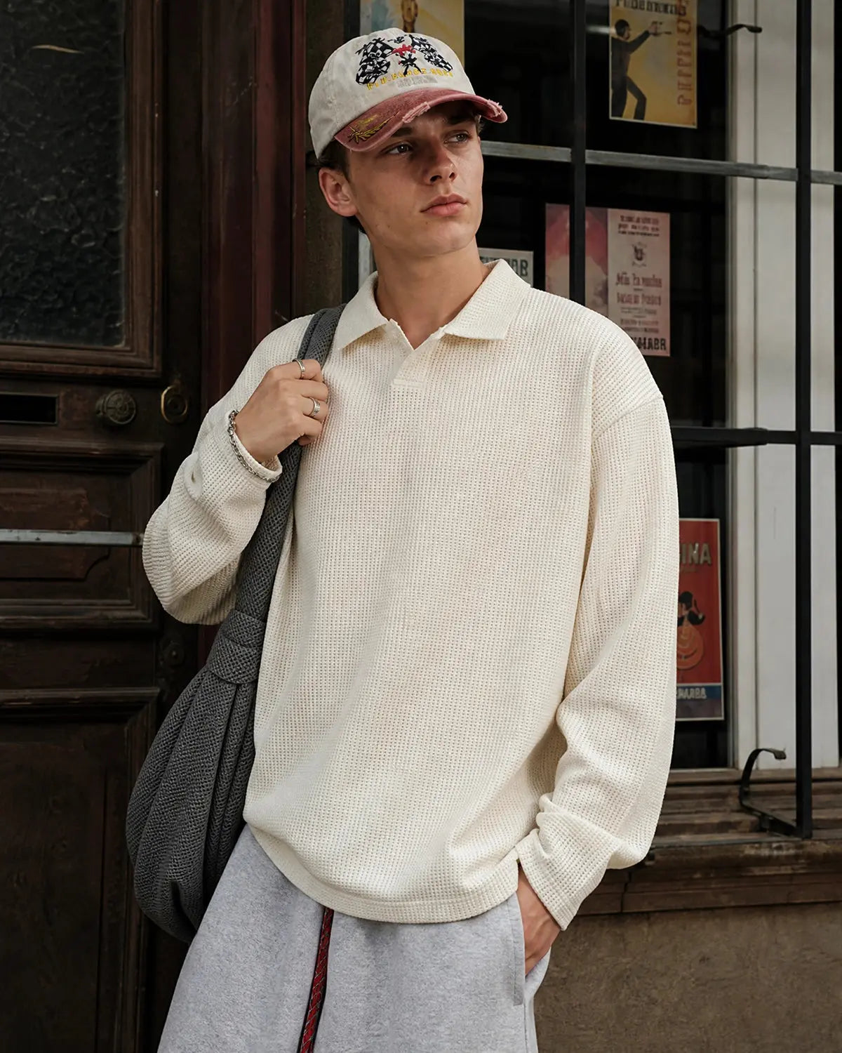 Inflation Streetwear waffle long sleeve polo shirt, black color, with a classic collar and textured fabric, casual men's t-shirt.