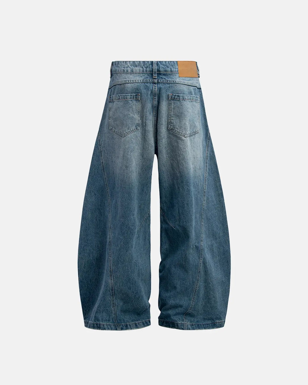 Distressed ripped baggy jeans by Flation streetwear, showing faded denim with frayed holes and relaxed fit.
