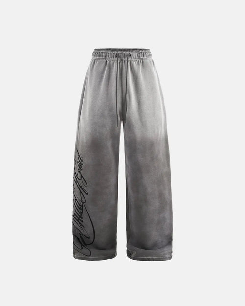 Acid washed Flation Streetwear sweatpants with relaxed fit and elastic waistband, casual streetwear style.