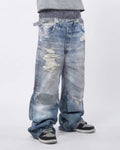 Layered digital print baggy jeans by Inflation Streetwear featuring a relaxed fit and bold graphic design.