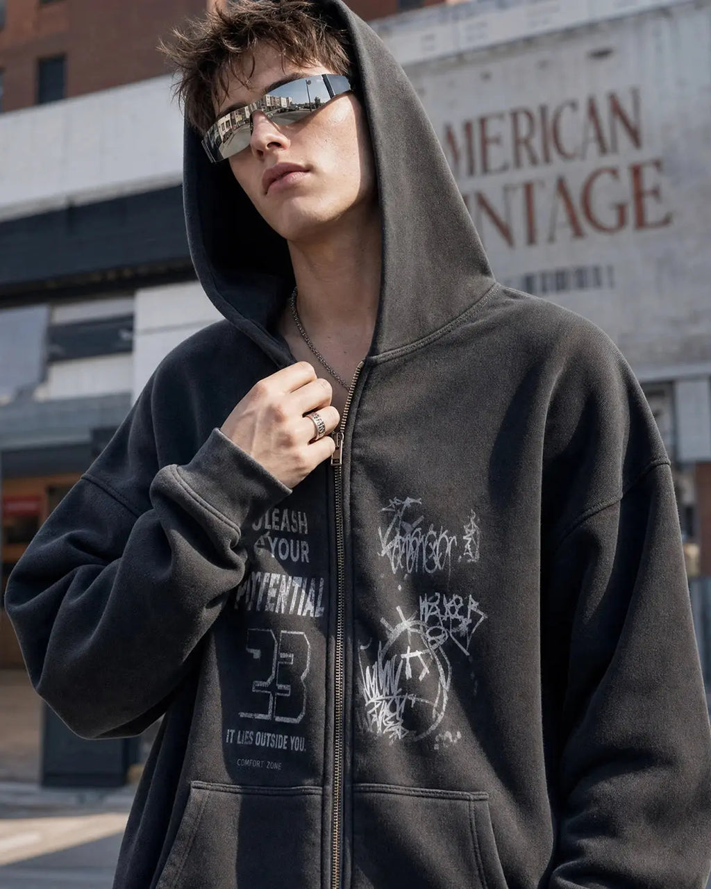 Graphic washed zip-up hoodie by Flation Streetwear, showing a casual hoodie with a faded graphic design and front zipper.