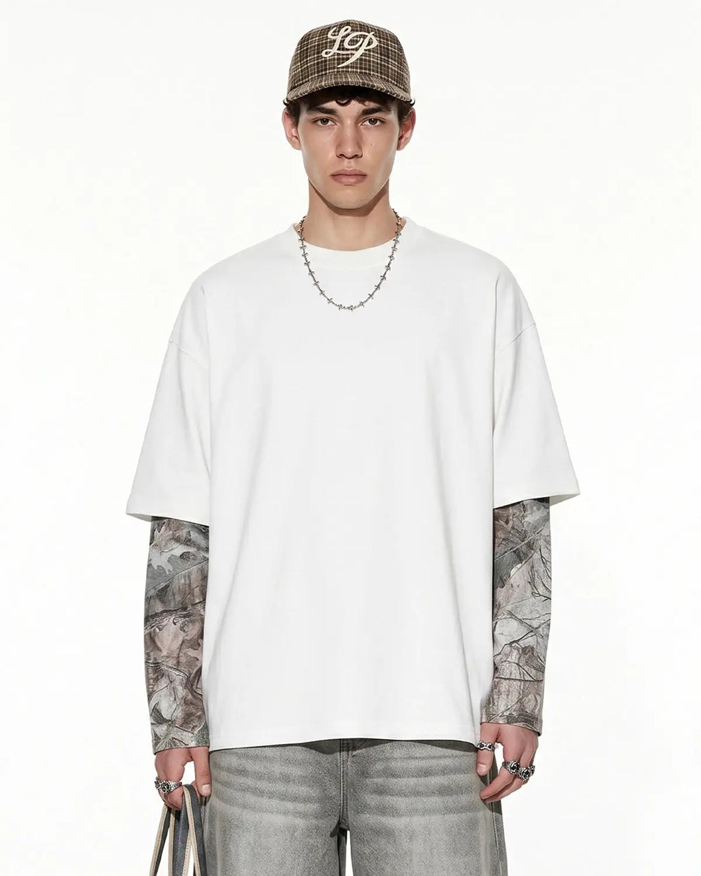 Camo layered oversized T-shirt by Flation Streetwear featuring a relaxed fit and camouflage design, styled with casual street fashion.