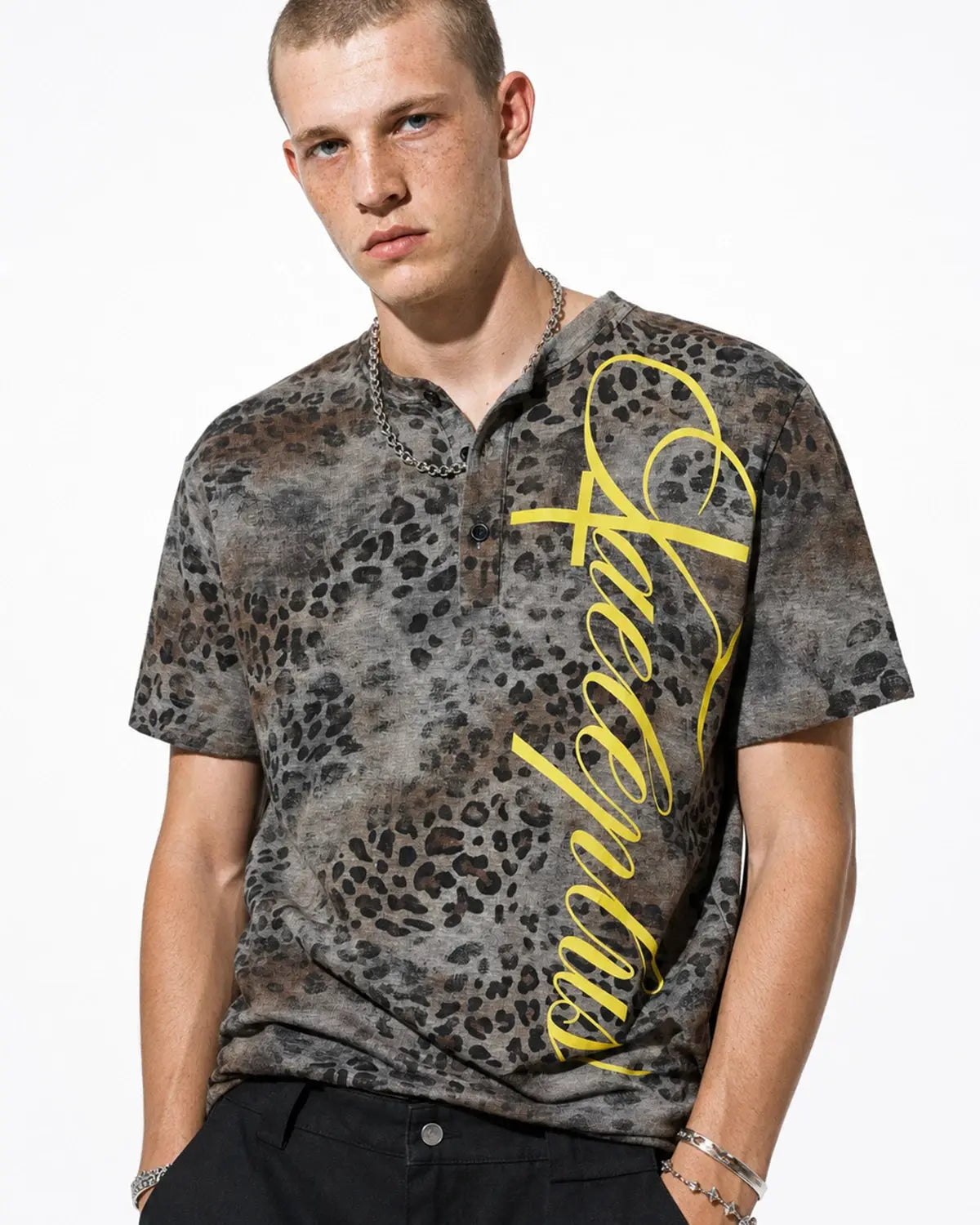 Inflation Streetwear Leopard Script Henley Baby Tee featuring a leopard print design and casual henley style for infants.