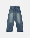 Deconstructed Barrel Jeans by INFLATION, stylish pants featuring unique distressed and deconstructed denim design.