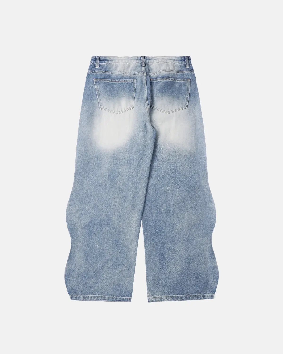 InflationUS washed baggy denim pants with relaxed fit, visible front pockets and distressed detailing on light blue denim fabric.