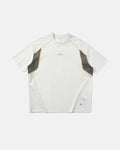 Inflation Streetwear glow-in-the-dark stitching oversized T-shirt showing a relaxed fit and luminous thread details on front.