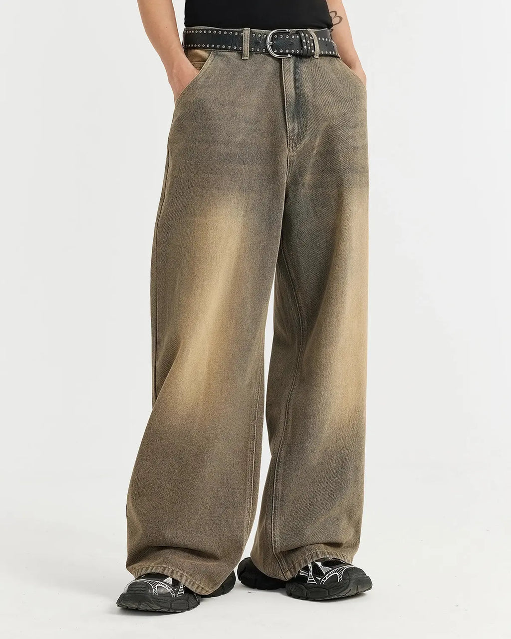 Brown acid wash baggy jeans from Flation Streetwear, featuring relaxed fit and distressed denim details.