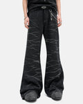 Black Whisker Wash Bootcut Jeans by INFLATION Streetwear, showcasing classic denim with whisker fade detailing and a bootcut fit.