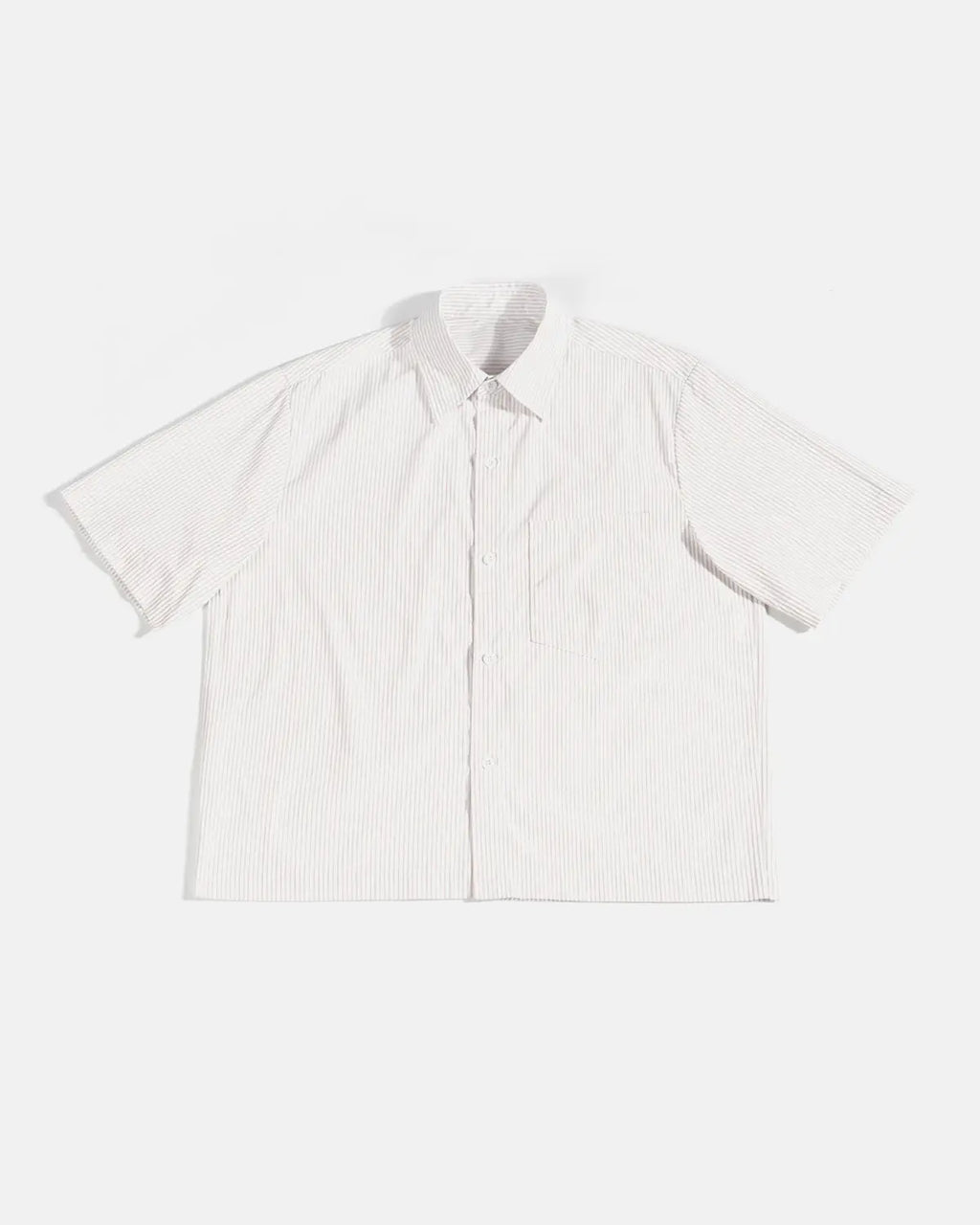 Inflation Streetwear boxy striped short-sleeve shirt with bold horizontal black and white stripes on lightweight fabric.