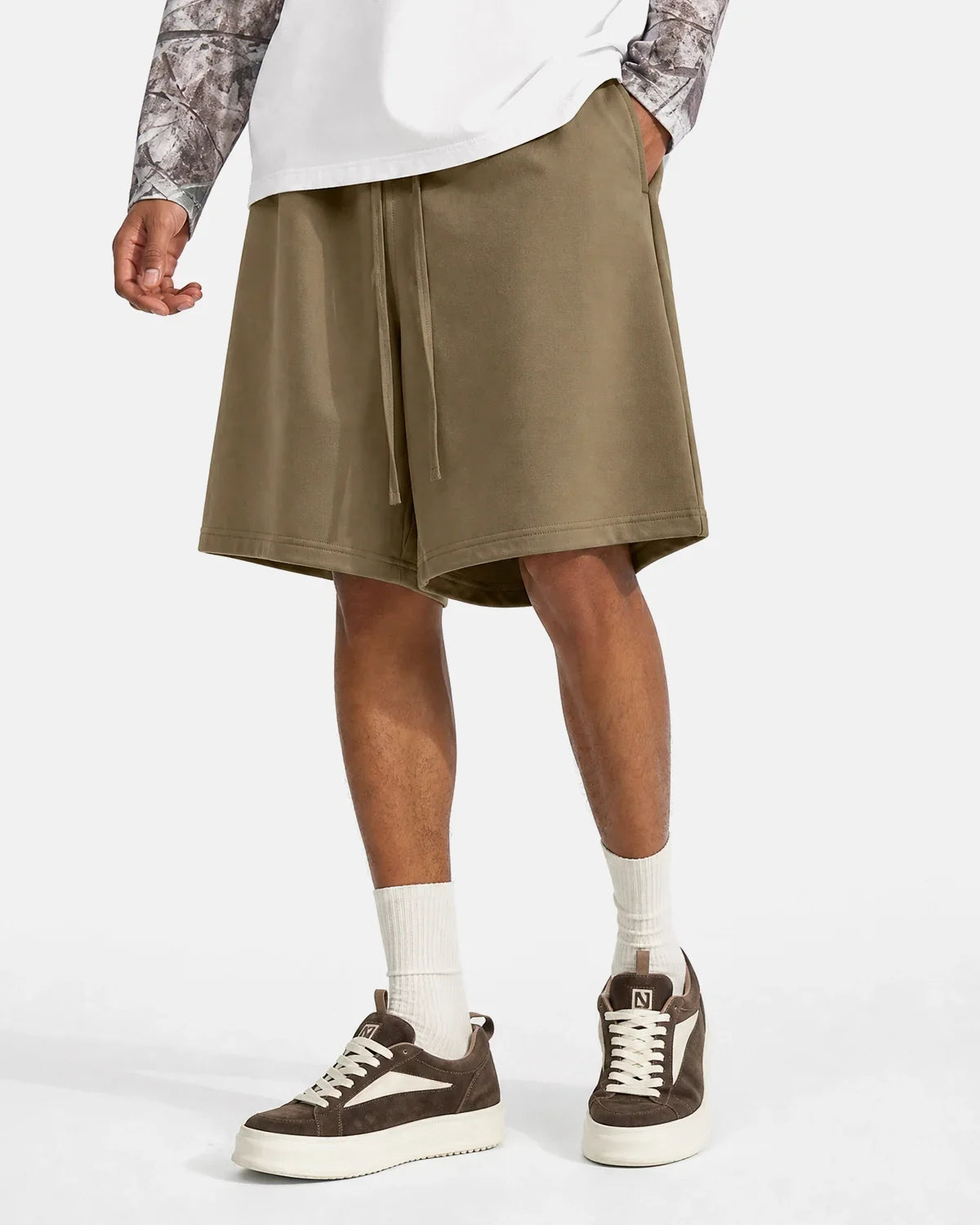 Inflation Heavyweight Drawstring Sweat Shorts in black, featuring a relaxed fit and adjustable waistband for streetwear style.