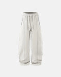 Blank Comfy Barrel Sweatpants by INFLATION Streetwear, showing the relaxed fit and soft fabric in a neutral color.