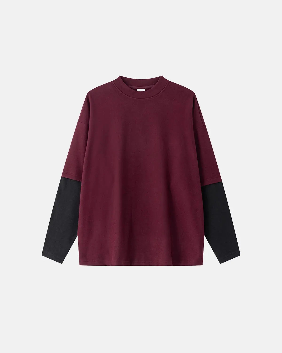 Color block long sleeve tee from Flation streetwear with bold color segments and a relaxed fit, shown on a model.
