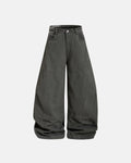 Camo patchwork barrel pants by INFLATION featuring a relaxed fit and streetwear style with camouflage and patchwork details.