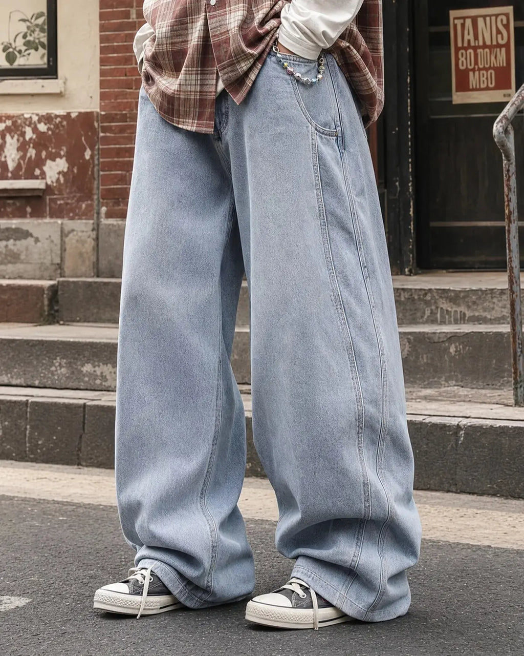 Flation acid washed distressed barrel jeans, streetwear style, featuring a relaxed fit and faded, worn-in denim look.
