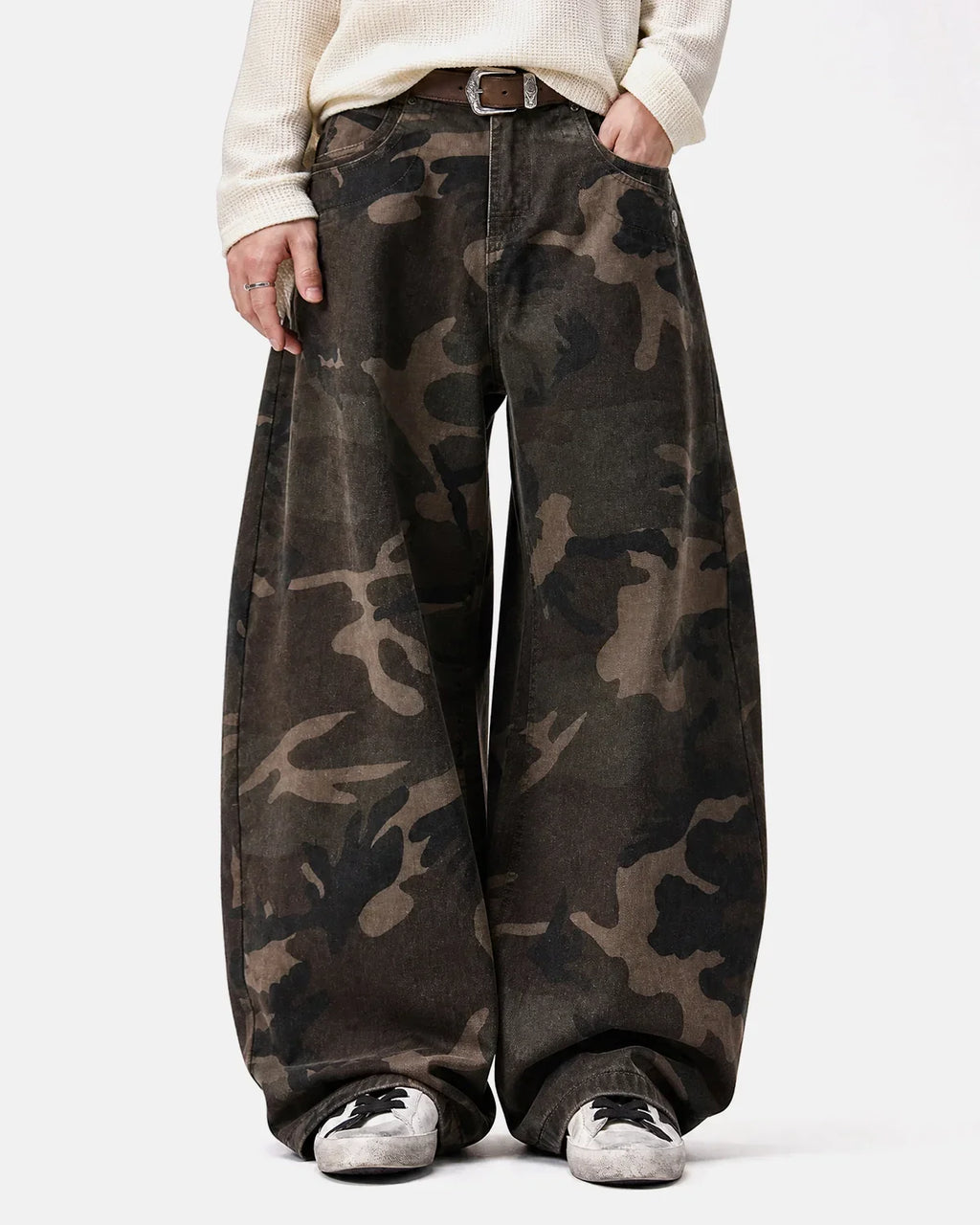 Inflation Streetwear studded camo barrel jeans, stylish pants with metal studs and camouflage pattern, casual streetwear fashion.