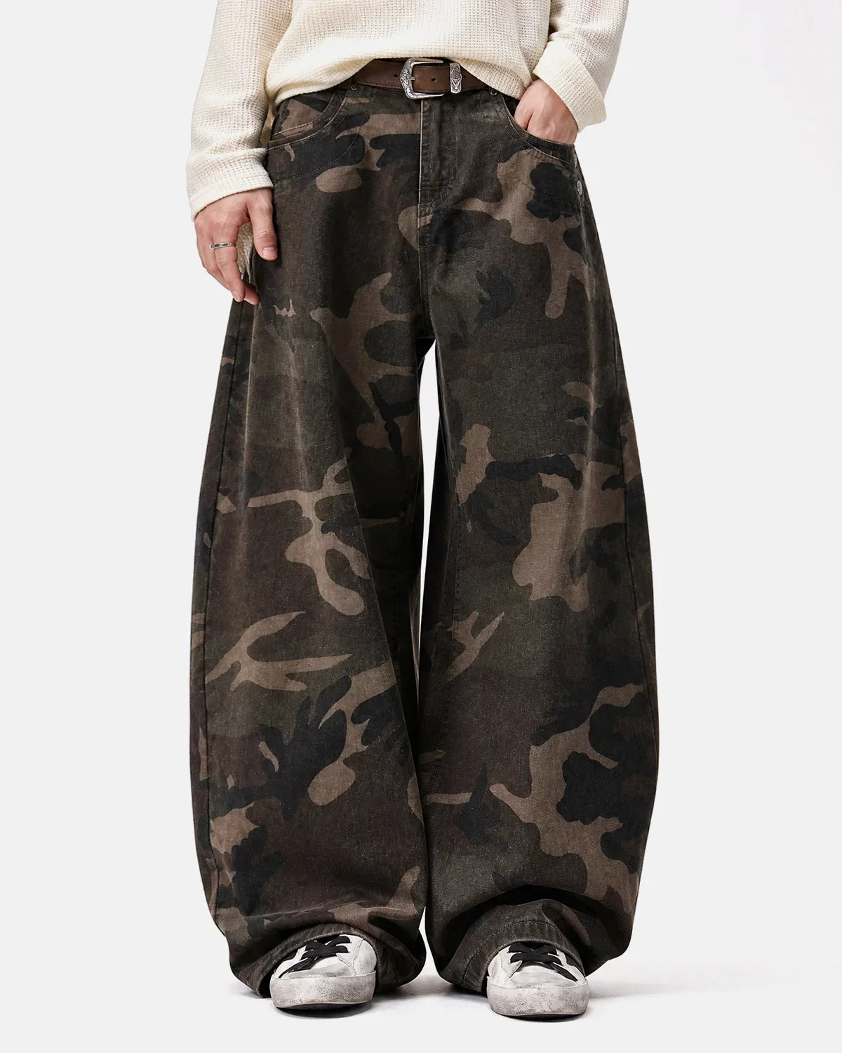 Inflation Streetwear studded camo barrel jeans, stylish pants with metal studs and camouflage pattern, casual streetwear fashion.