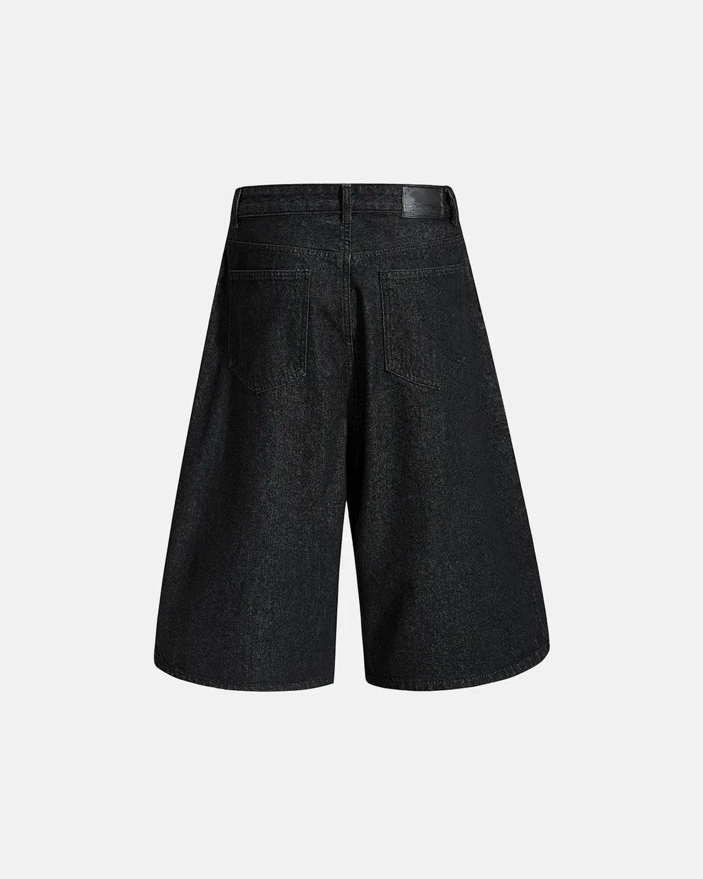 Asymmetric button raw denim jorts by INFLATION featuring distressed details and raw hem, casual streetwear pants for a trendy look.