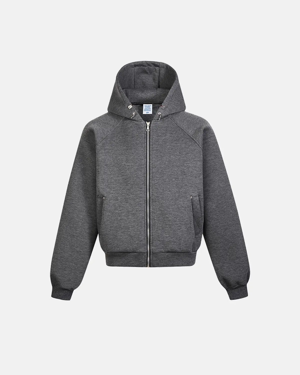 Flation grey boxy zip-up hoodie with a front zipper, featuring a relaxed fit and casual style, displayed on a hanger.