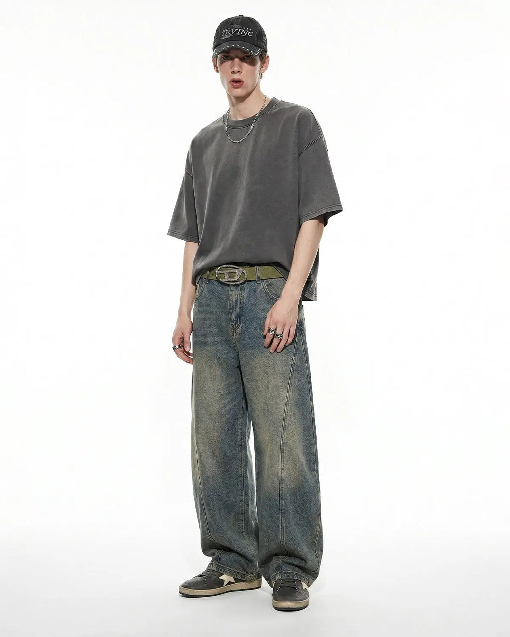 Distressed boxy washed T-shirt by Flation Streetwear, showing a relaxed fit with faded, vintage-style fabric and distressed details.