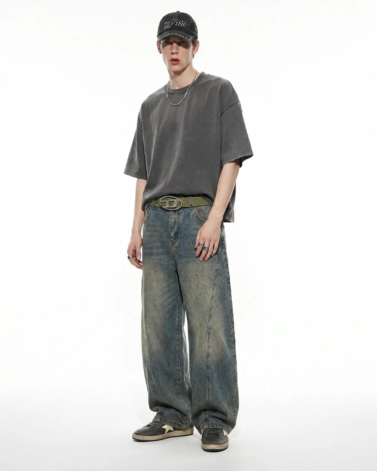 Distressed boxy washed T-shirt by Flation Streetwear, showing a relaxed fit with faded, vintage-style fabric and distressed details.