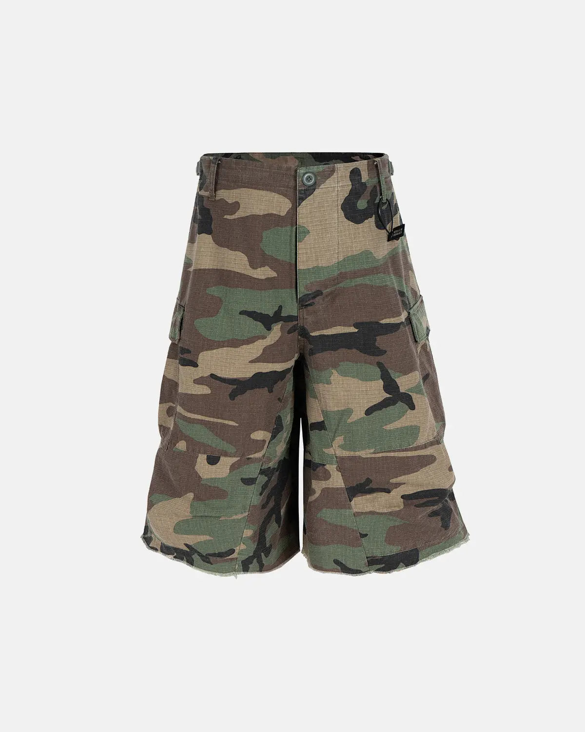 Inflation Streetwear oversized camo cargo longline shorts with multiple pockets and a relaxed fit, styled for casual streetwear.