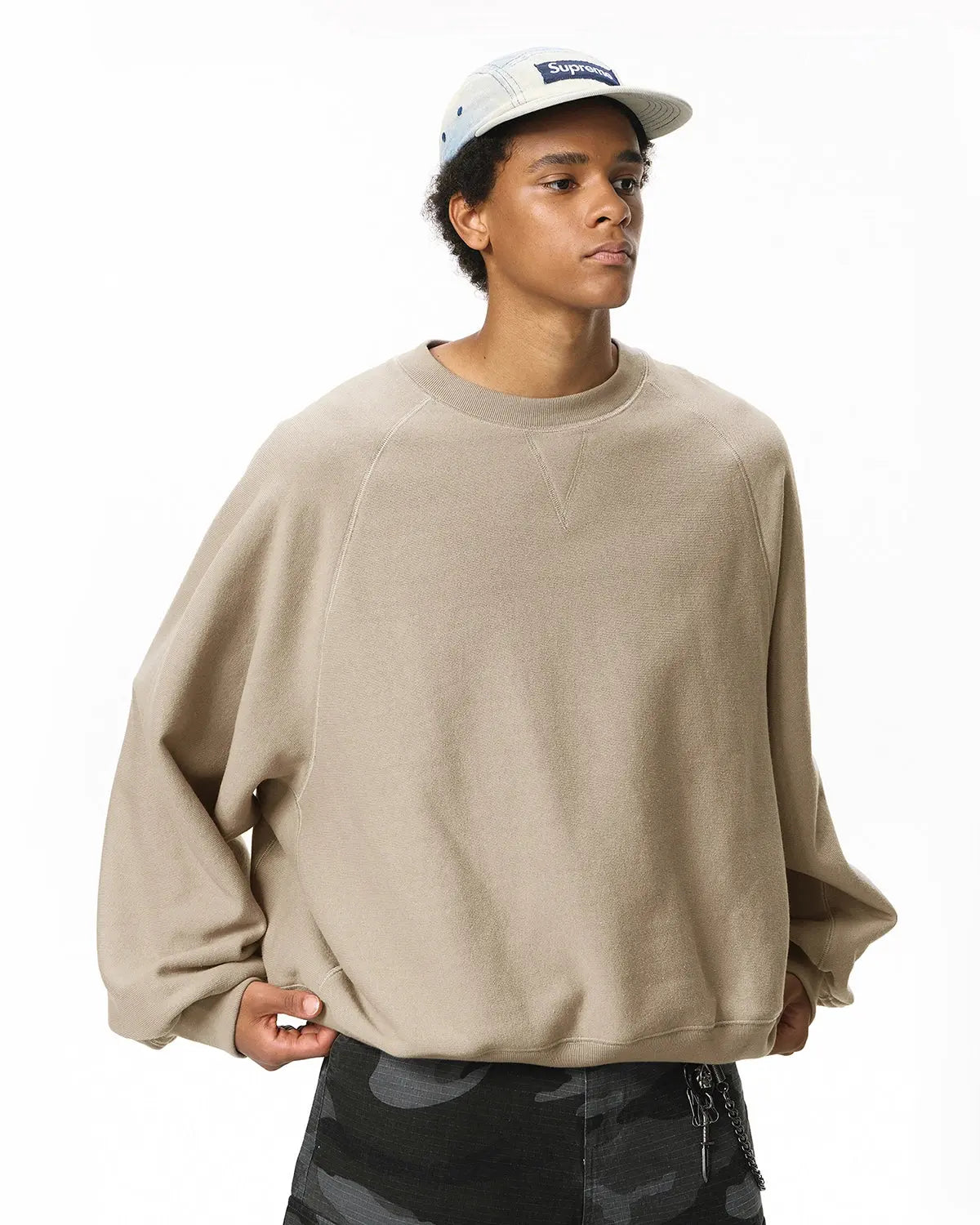 Inflation streetwear batwing sleeve fleece crewneck sweatshirt with oversized fit and cozy fabric, black color, casual style.