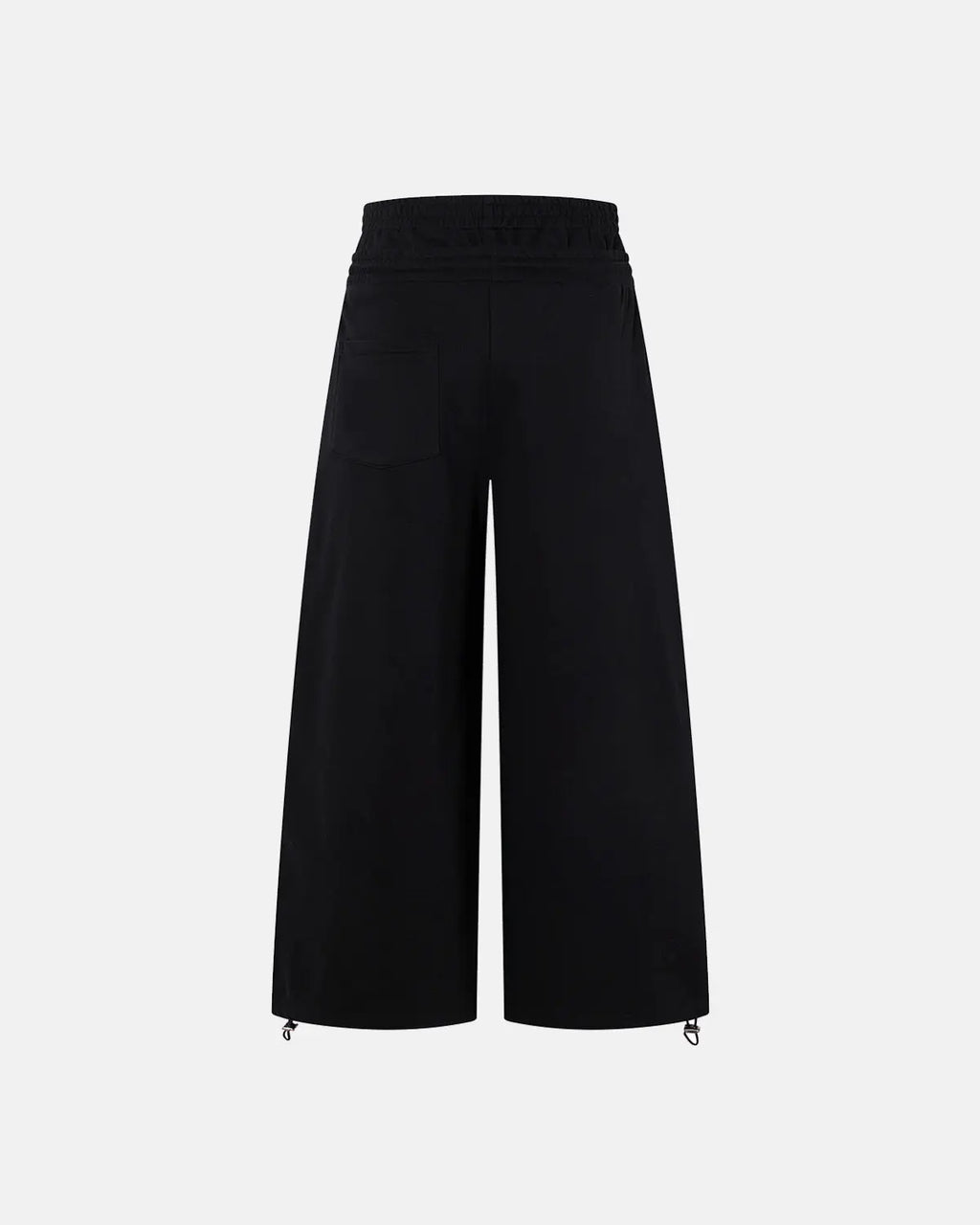 Inflation streetwear layered waist baggy wide-leg sweatpants with a relaxed fit and drawstring waist, shown on a model.