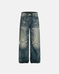 Vintage distressed baggy jeans by INFLATION, featuring a relaxed fit, distressed details, and streetwear style in a casual look.